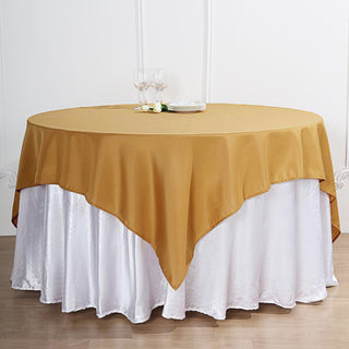 Create a Luxurious Atmosphere with the 70"x70" Gold Square Seamless Polyester Table Overlay