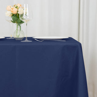 Create a Memorable Event with the Navy Blue Polyester Square Table Overlay
