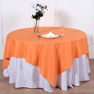 Add a Pop of Festive Orange to Your Tables with the 70"x70" Orange Square Seamless Polyester Table Overlay