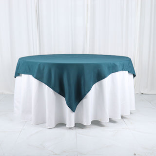 Elevate Your Event Decor with the Peacock Teal 70x70 Table Overlay