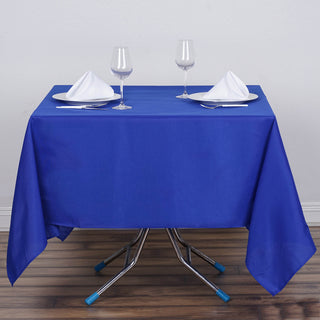 Create a Chic and Elegant Setting with the 70"x70" Royal Blue Square Seamless Polyester Table Overlay
