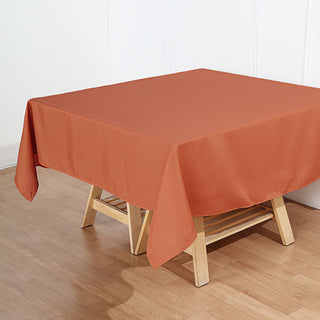 Enhance Your Event Decor with the Terracotta (Rust) Square Seamless Polyester Tablecloth