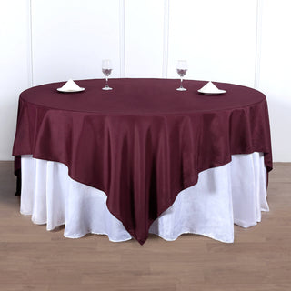 Create a Memorable Event with the Burgundy Square Polyester Table Overlay