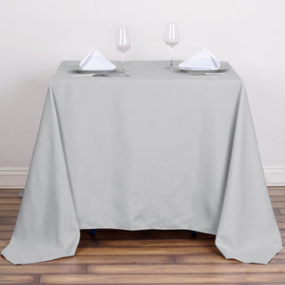 Enhance Your Event Decor with the Silver Polyester Table Overlay