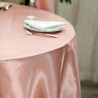 Elevate Your Event Décor with the 108" Dusty Rose Seamless Satin Round Tablecloth