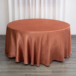 Elevate Your Event with the Terracotta (Rust) Seamless Satin Round Tablecloth