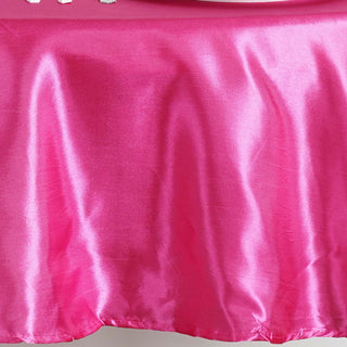 Add a Touch of Elegance with the 90" Fuchsia Seamless Satin Round Tablecloth