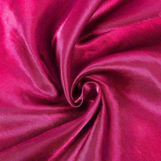 Enhance Your Event Decor with the 90" Fuchsia Seamless Satin Round Tablecloth