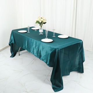 Create a Stunning Tablescape with the Peacock Teal Seamless Satin Rectangular Tablecloth