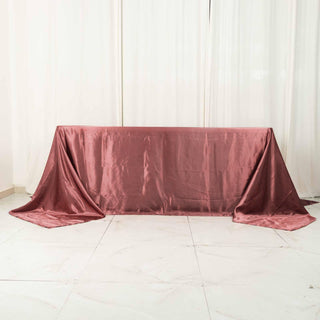 Elevate Your Event with the 90"x132" Cinnamon Rose Satin Seamless Rectangular Tablecloth