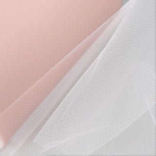 Create Stunning Crafts with our Blush Tulle Fabric Bolt