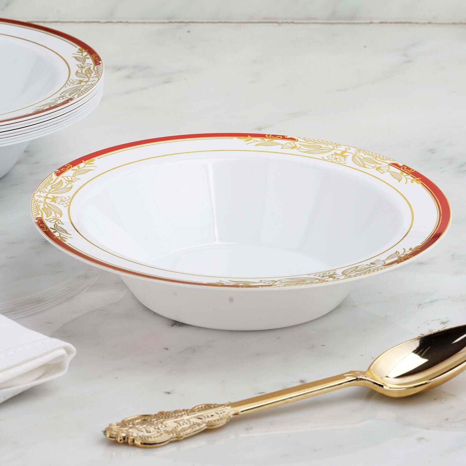 https://tableclothsfactory.com/cdn/shop/products/White-Round-Disposable-Plastic-Soup-Bowl-With-Gold-Vine-and-Red-Rim.jpg?v=1689407474